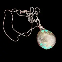 vintage turquoise nugget pendant necklace with a sterling silver chain