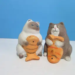 vintage bisque ceramic cat with fish salt and pepper shakers
