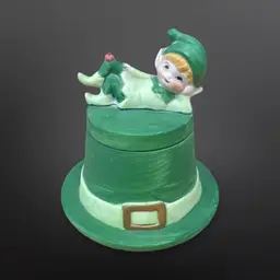 Vintage Lego Matte Ceramic Irish Pixie Elf W/ Ladybug Laying On Green Top Hat Candle