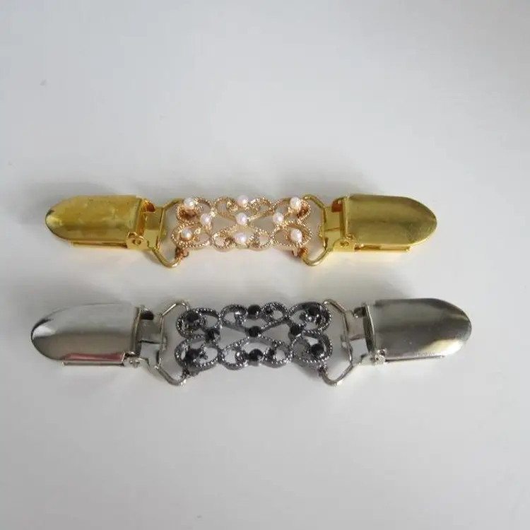 Set of 2 sweater clips - gold with faux pearls and silver with black rhinestones