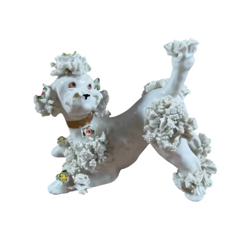 010. Vintage Japan Ceramic Spaghetti Poodle 4”