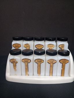10 count Griffith's  milk glass spice jars with black metal lids and rack