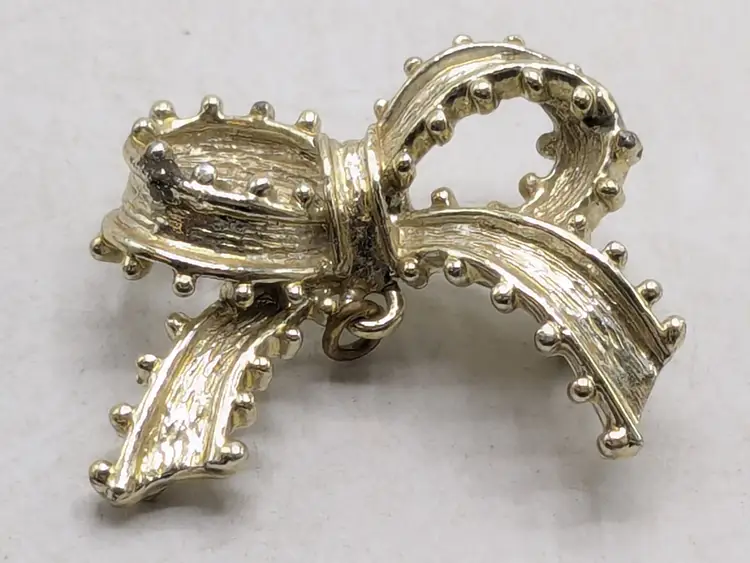 Vintage Tancer II Silver Tone Bow Brooch with Textured Detail READ