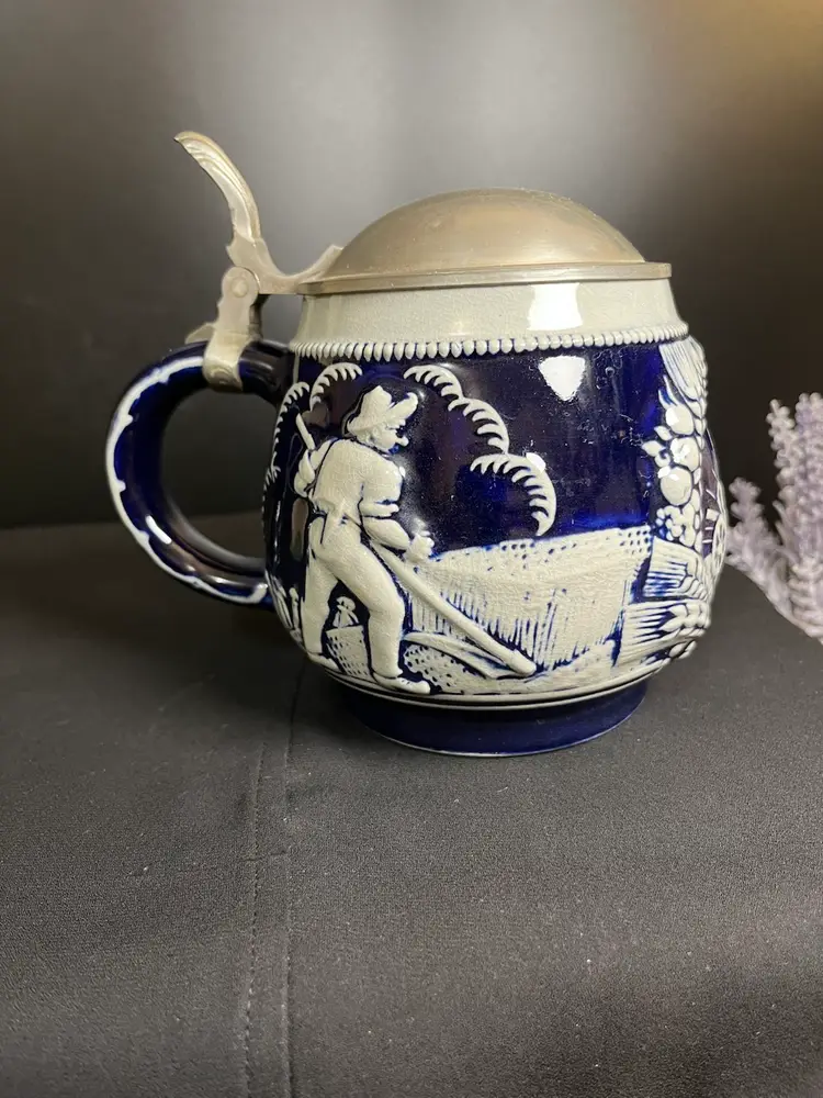 Squat Round Beautifully crafted Cobalt Blue Beer Stein. Makers Mark is RM G #3824 P. Depicts "Sowing & Reaping" Wheat-Lot 61