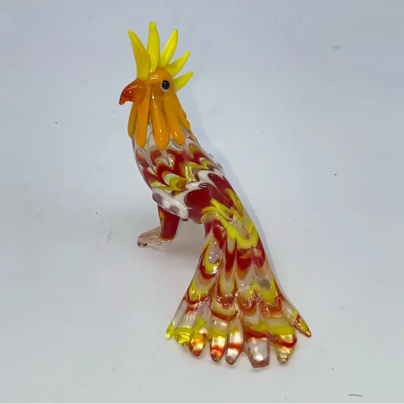 #1451 vintage blown glass rooster figurine with red, yellow, and white swirls.