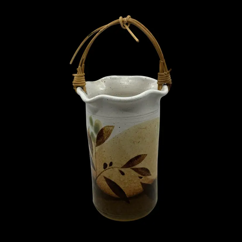 Jeff Chang Raku pottery vase with rattan handle and leaf motif. Hawaii