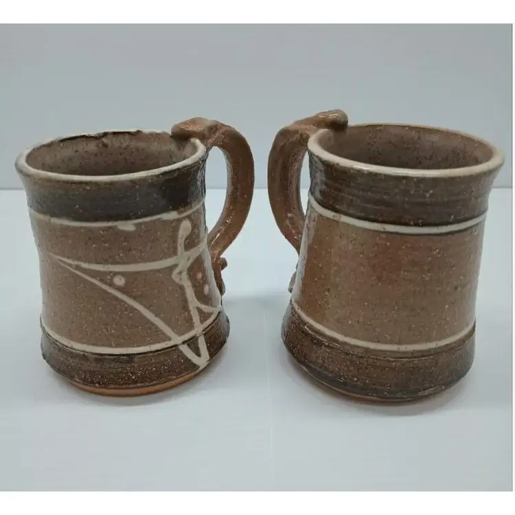 Vintage Studio Pottery set of 2 mugs. Signed.
