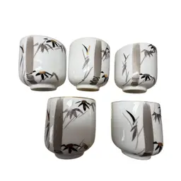 SET OF 5 VTG SAKE/TEA CUPS, 
2 5/8”H x 2 1/2”DIAM. BAMBOO DESIGN WITH GOLD TRIM; BACK-
STAMPED JAPAN, VERY NICE PRE-
OWNED CONDITION. (Please VIEW Photos).