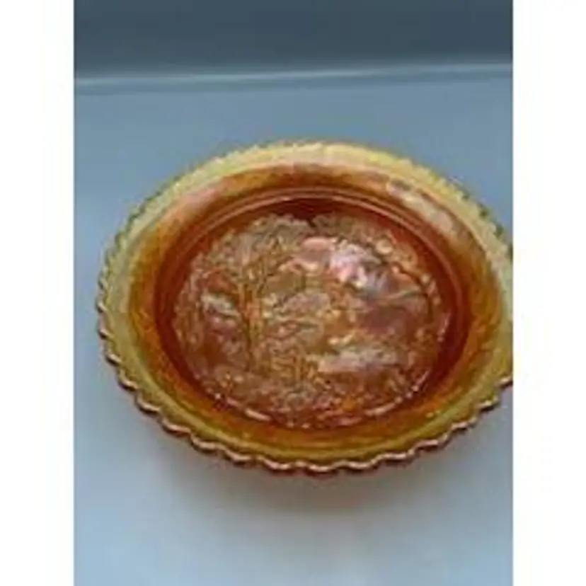 Vintage Carnival glass footed marigold bowl with windmill