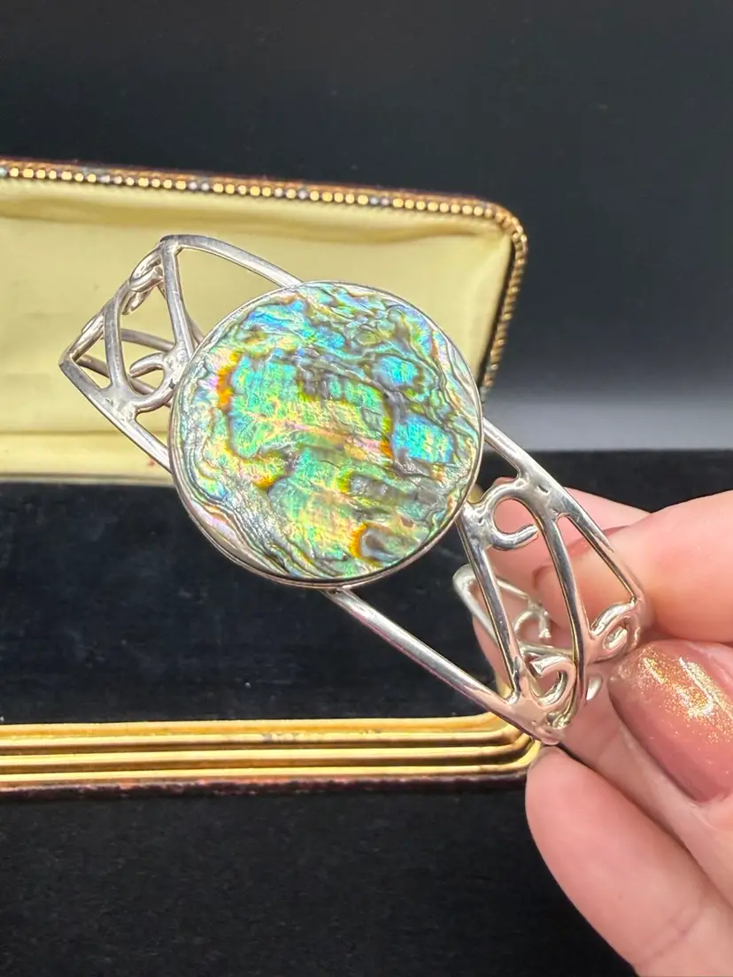 sterling silver cuff bracelet featuring a large abalone shell inlay