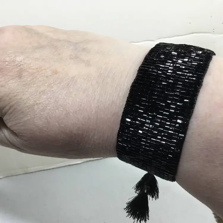 Sparkly, flat band, adjustable bracelet, black glass bugle beads, tassels