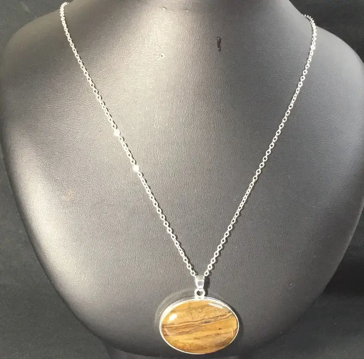 Necklace, silver tone chain and oval bezel with large tiger's eye pendant