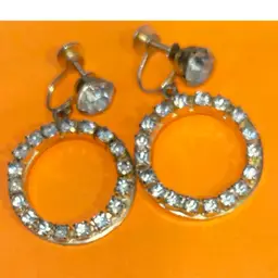 Vintage Signed Coro 60s Rhinestone Screw Back Hoop Earrings Set in Gold Metal.