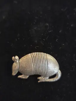 Antiqued Silver Plated Armadillo Brooch.