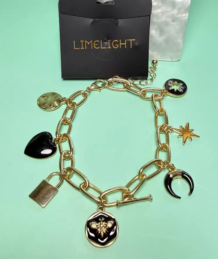 New NWT Limelight Gold Tone 8" Charm Bracelet Black Enamel Bee Horn Lock Heart
