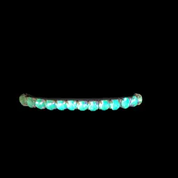 Goldtone Green  Stretchy Bracelet . That GLOWS!!