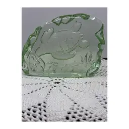 A vintage molded green glass sea turtle figurine or paperweight.