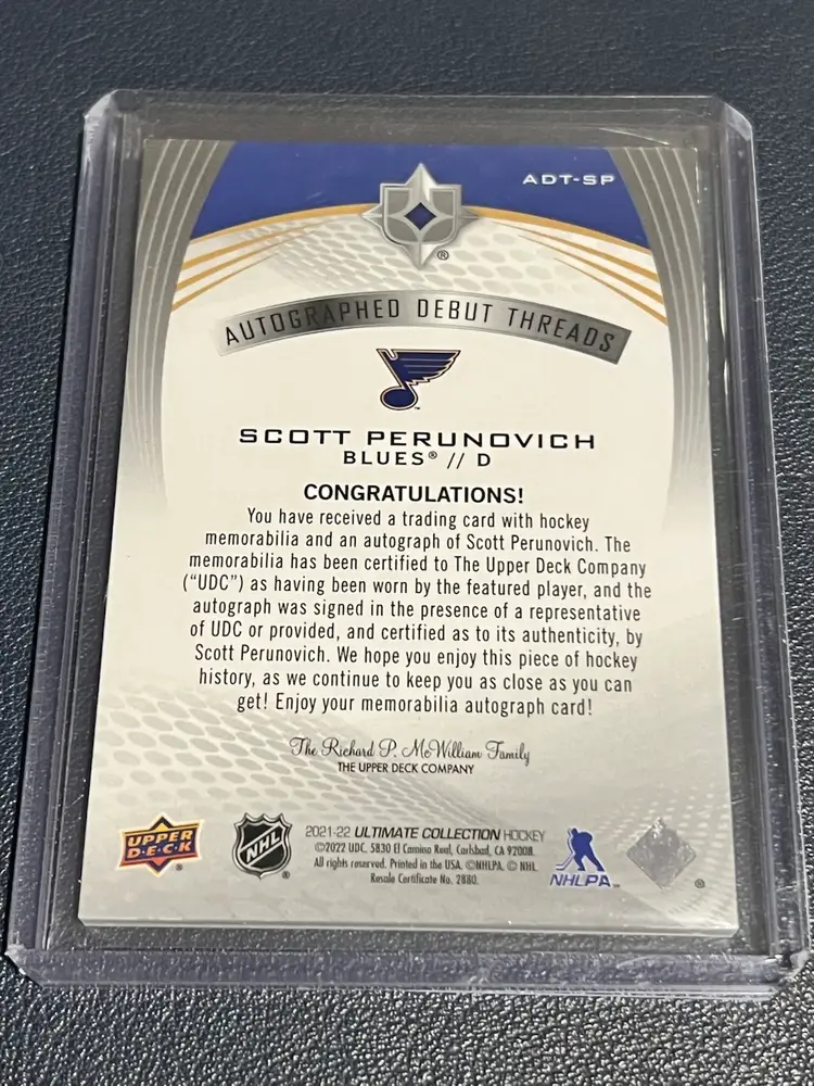 2021-22 Upper Deck Ultimate Autograph Debut Threads Scott Perunovich /99