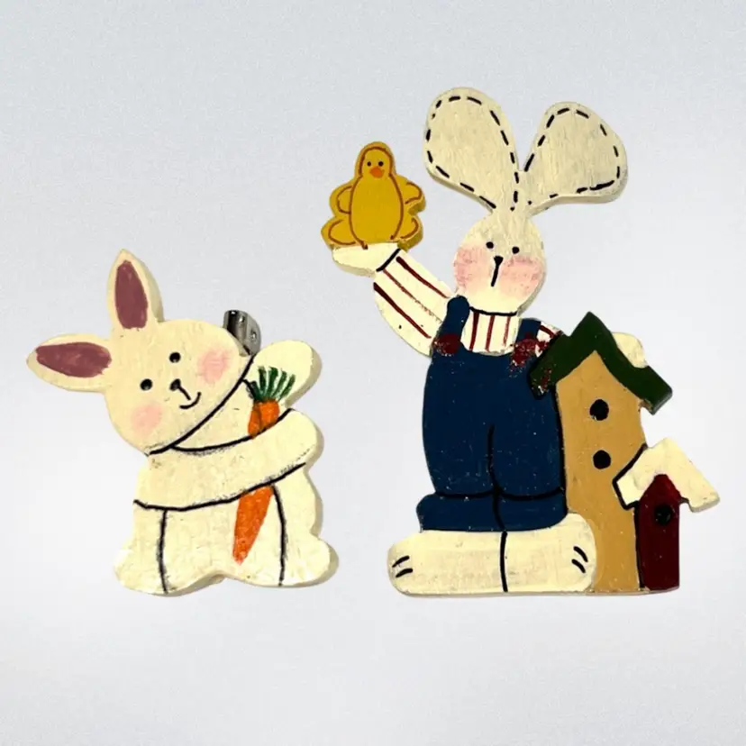 2 Bunny 🐰 Hand-Painted Wooden Pins. One Holding a Little Chick 🐥 & One Hugging Favorite Snacking Carrot 🥕. Perfect for Easter.