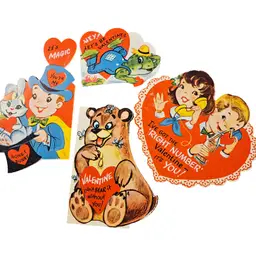 vintage Valentine's Day die-cut cards, likely from the 1930s to 1960s