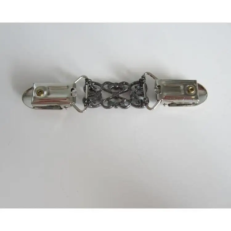 Set of 2 sweater clips - gold with faux pearls and silver with black rhinestones