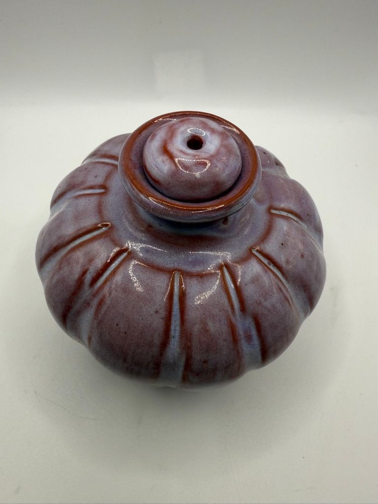 Purple Pottery With Stopper