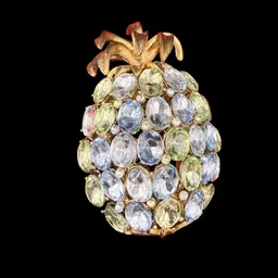 vintage gold-tone pineapple brooch with pastel blue and green rhinestones