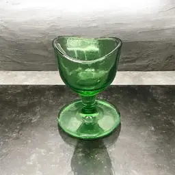Vintage Green Glass Eyewash Cup. 2 1/4” wide and 2 1/4” tall