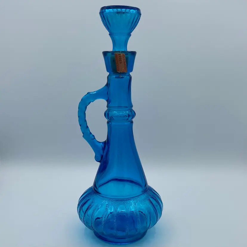 Vintage blue genie bottle with handle