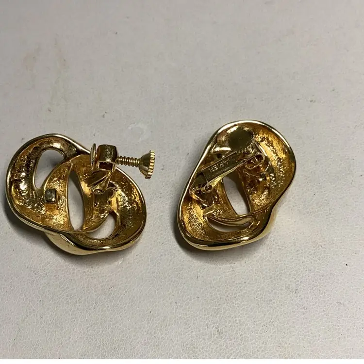 Goldtone swirl Clipon Earrings - Signed Napier