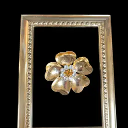 Signed Brooch-Jordan-Gold Toned 5 Petal "Buttercup" Flower w/ an Amber Rhinestone in Middle w/ Clear Smaller Rhinestones Surrounding it
