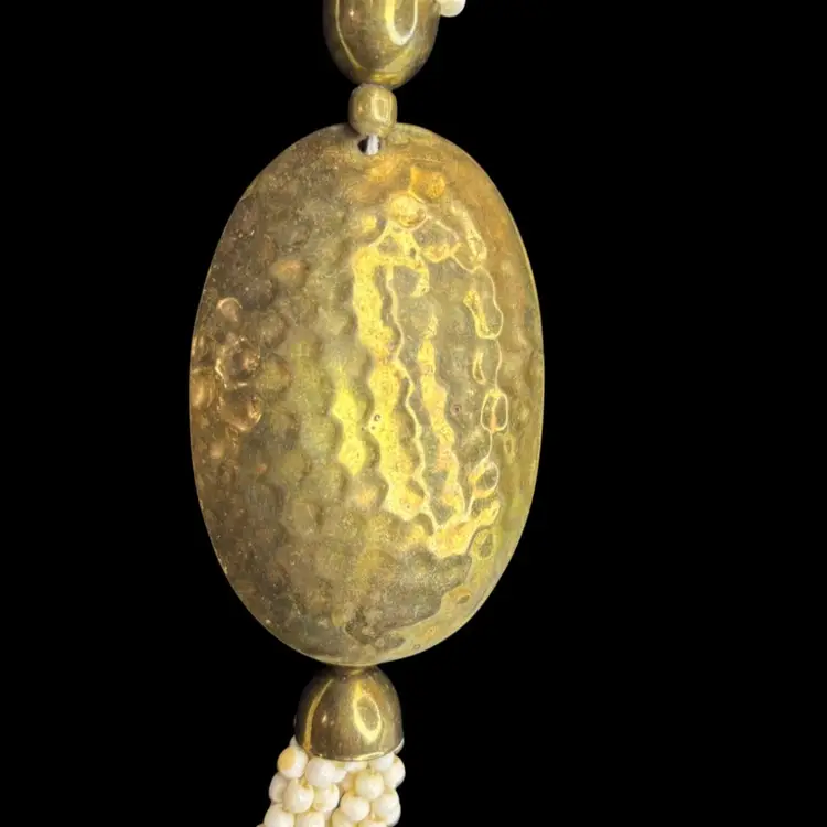 Vintage Milk Bead Necklace With A Hammered Brass Or Copper Pendant