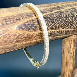 Gold Tone Hinged Bracelet With Baguette Stones CZ’s