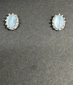 Light Blue Oval Silver Tone Stud Pierced Earrings.