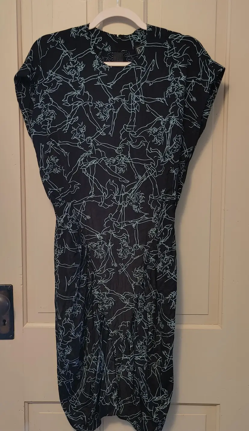 Dress- Brand: Nicole Miller. Size 6. NWT. Retail $234. Black & teal sheer dress. Material- unknown. No callouts.