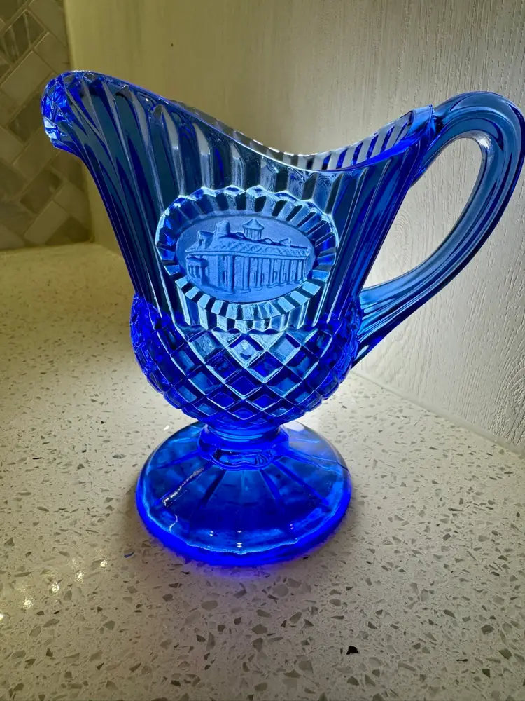 Vintage Avon Mount Vernon footed creamer, also referred to as a sauce or syrup pitcher.