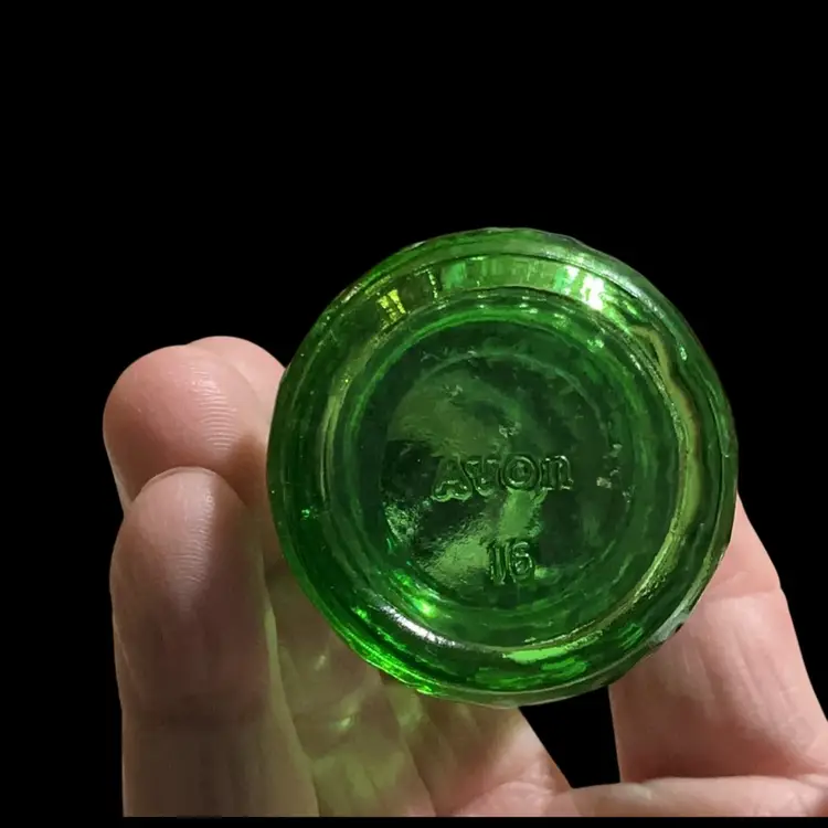 Vintage  1970s Avon Christmas Candle Empty Cologne Bottles. Often filled With Avon Cologne. Green Glass With Metallic Flame Shape Lids. Collectables!