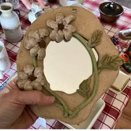 Pottery mirror