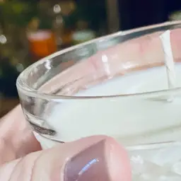 handmade vanilla soy candle in vintage glass