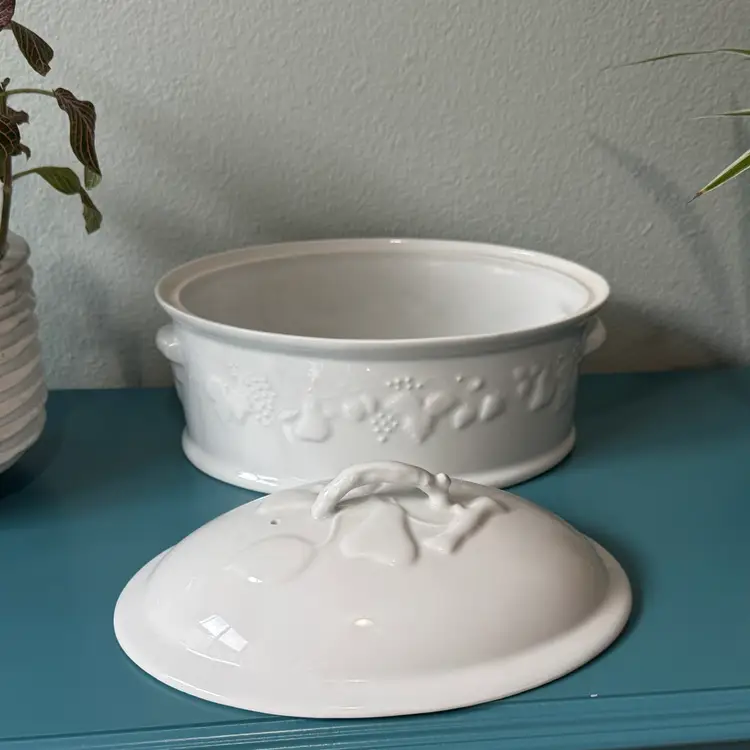 Philippe Deshoulieres oval covered casserole dish in the "California Blanc de Blanc" pattern.