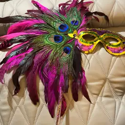 Mardi Gras Peacock, Purple And Black Feather Mask On A Stick. New Orleans Fat Tuesday Party