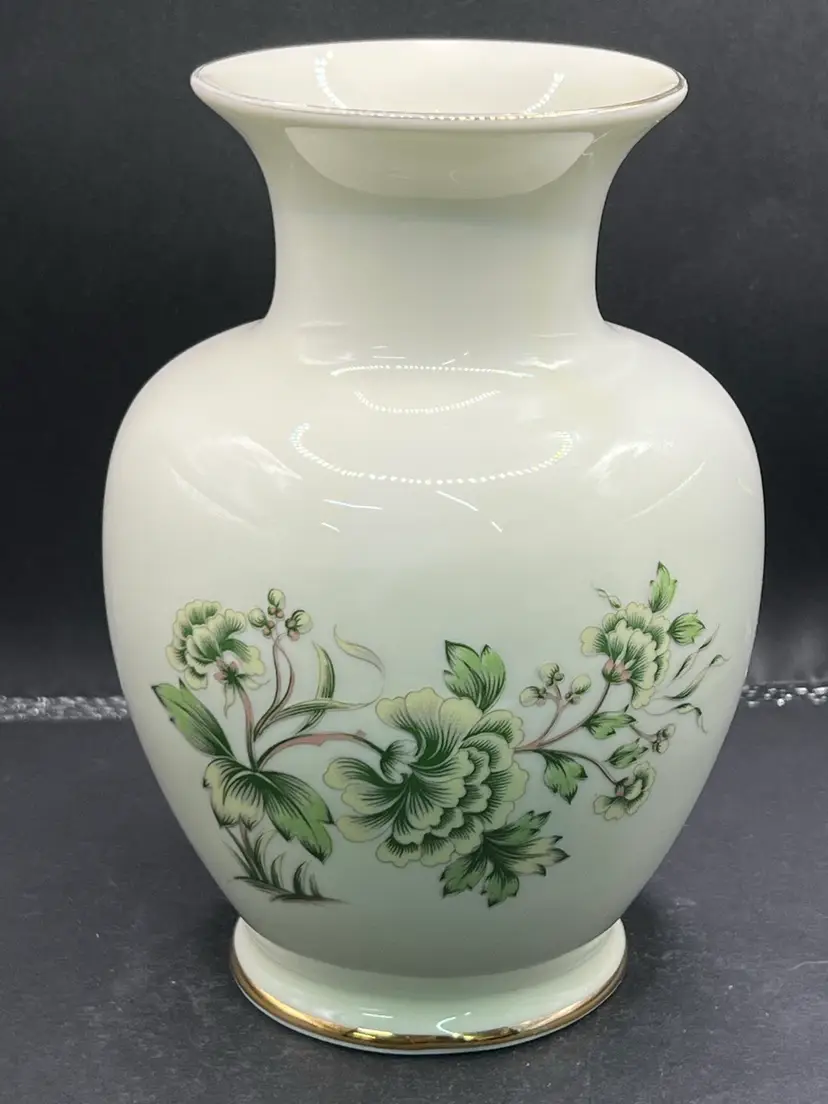 This is a Hollohaza Hungarian porcelain vase.