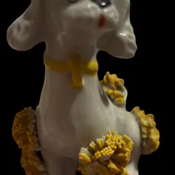 White Spaghetti Poodle Figurine with Yellow Accents