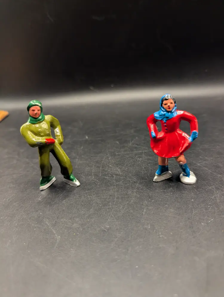 Vintage Set of 2 Barclay Type Metal Hand Painted Skaters Boy and Girl.