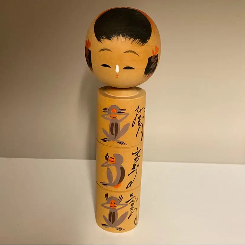#5112 Hand-painted vintage Japanese Kokeshi doll with monkey motif and calligraphy.
