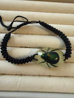Adjustable Bug Bracelet It GLOWS