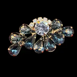 vintage blue and clear rhinestone abstract flower brooch