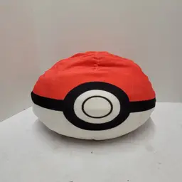 pokemon ball plush. has small tear