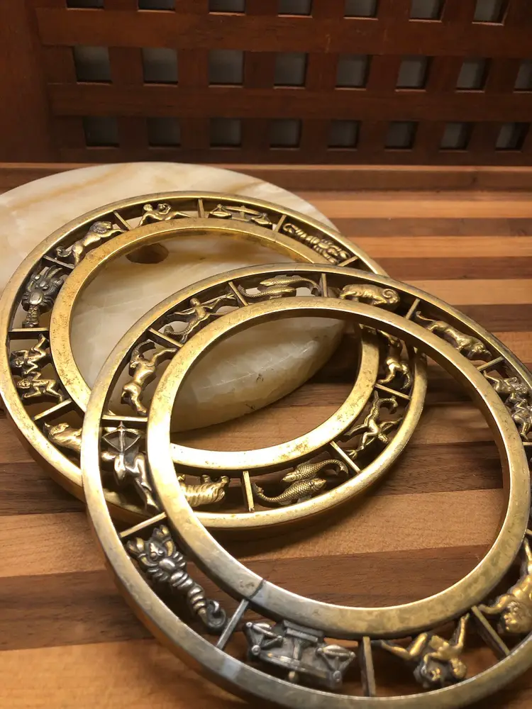 Two Vintage Brass Zodiac Trivets