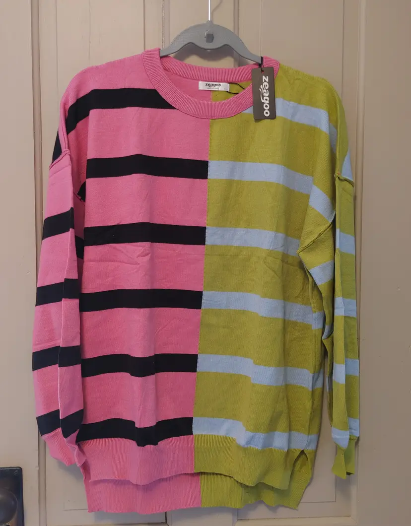 Top- Brand: Zeagoo. Size Large. Multicolored stripe top. NWT. 50.7% Viscose, 28.6% Polyester, 20.7% Nylon. No callouts.